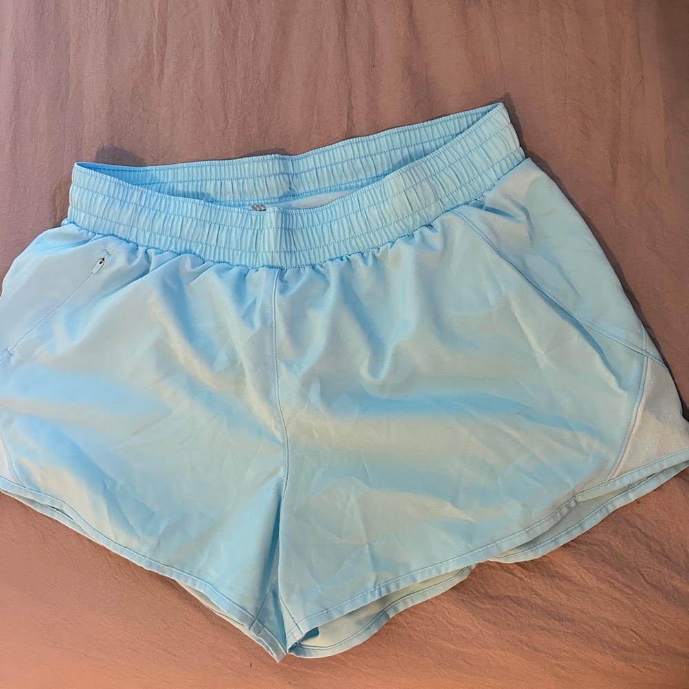 “All in motion” athletic shorts